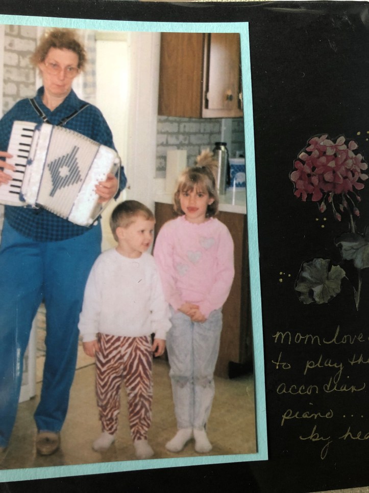 Mom  playing accordian  with Megan and Scott